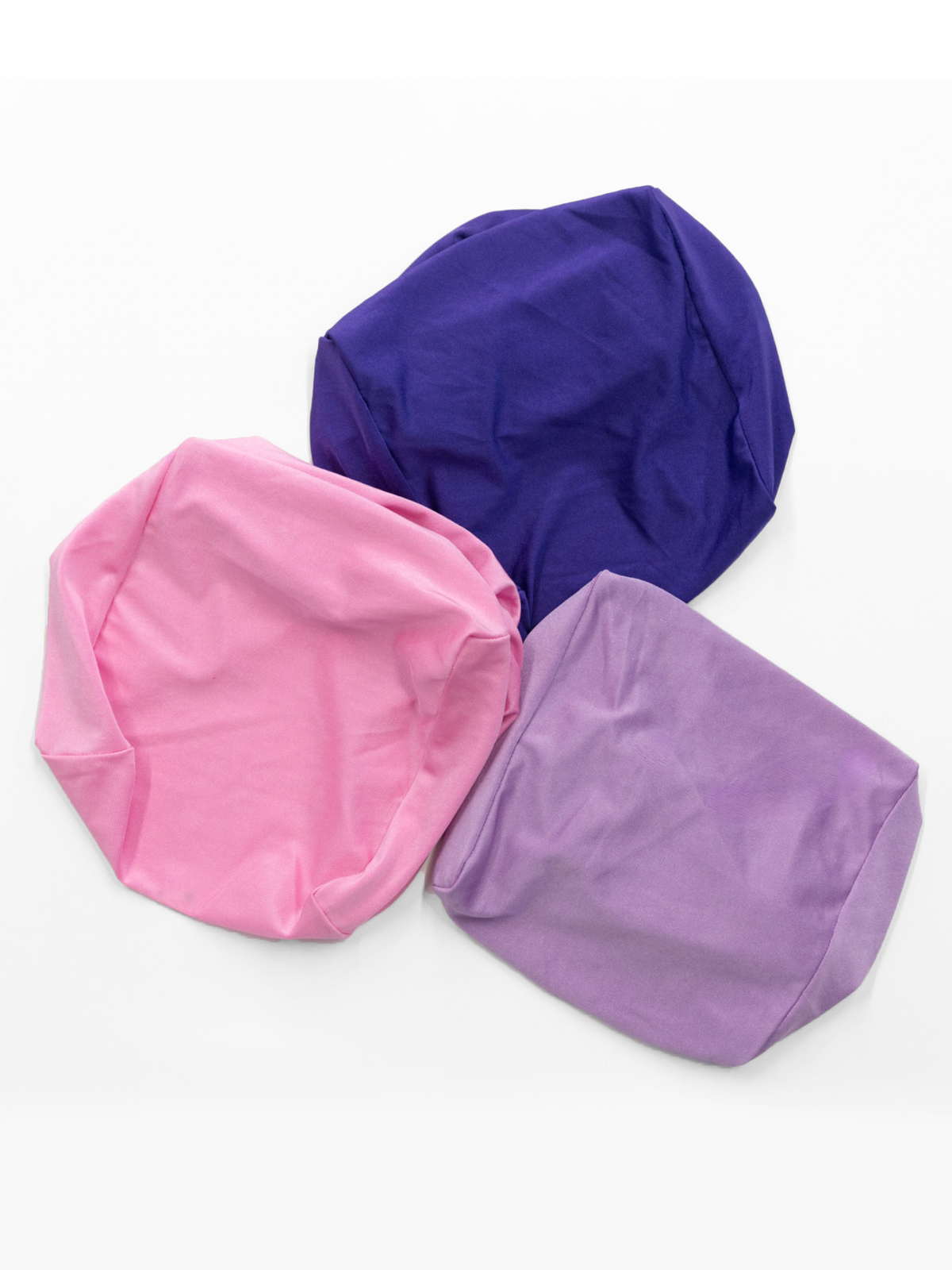 Three foam cube covers shown without cubes in light pink, lavender and purple — covers only, foam cubes sold separately