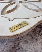 Close up image of balance board showing FlexyMinds branding